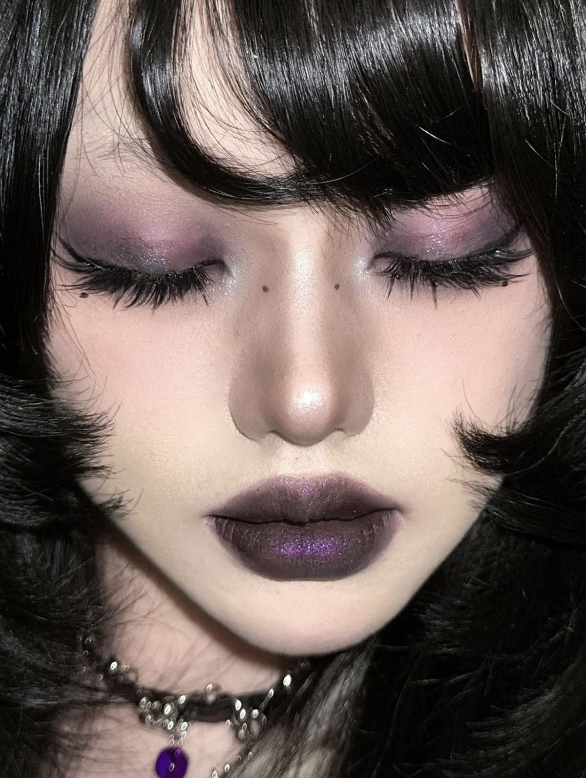 Black Purple Makeup Ideas: 5 Looks for Eyes and Lips 2 Person with deep purple lipstick and shimmering purple eyeshadow and black hair
