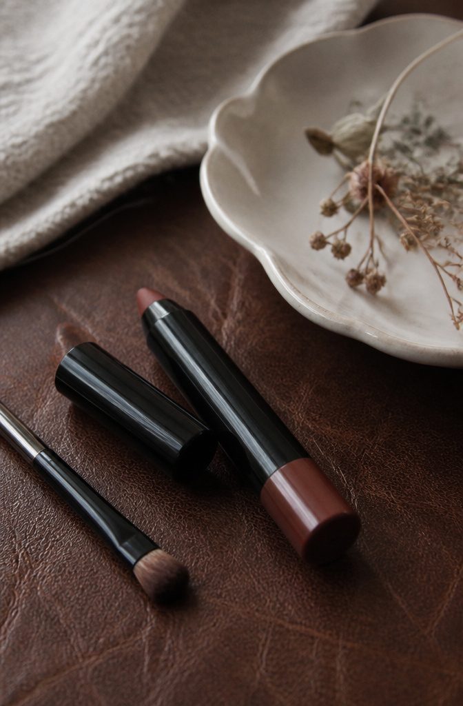 Make Up For Ever Artist Color Crayon in a leather setting.