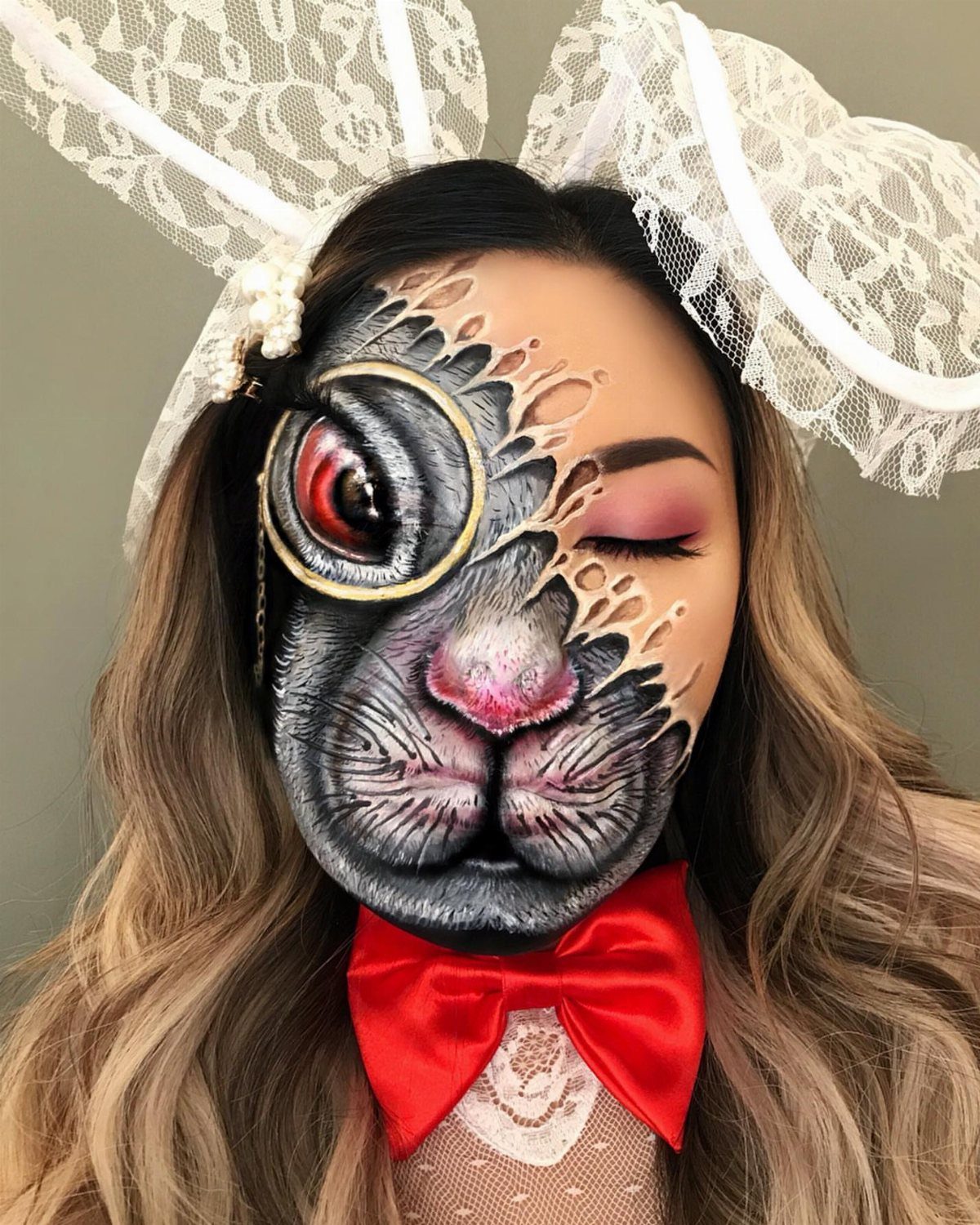 Bunny Face Makeup: 8 Ideas for Whiskers, Blush and More 8 Woman with half her face painted as a grey rabbit wearing lace ears
