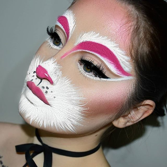 Bunny Face Makeup: 8 Ideas for Whiskers, Blush and More 1 Person with bunny face makeup featuring a pink nose and white muzzle paint.