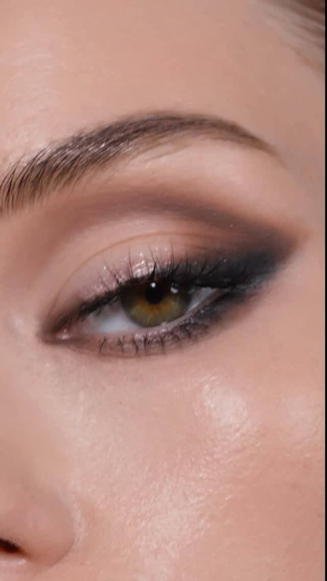 Close-up of a smokey eye with blended dark eyeshadow and black eyeliner.