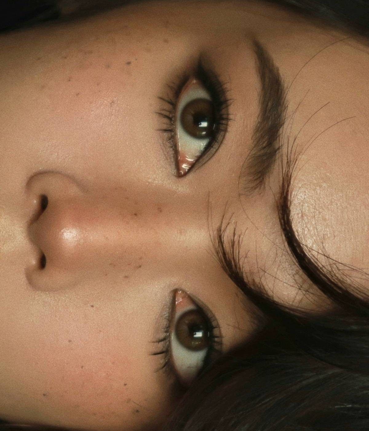 Pretty Monolid Eyes: 5 Makeup and Styling Ideas to Try 1 Monolid eyes with sharp black winged eyeliner and long dark eyelashes.