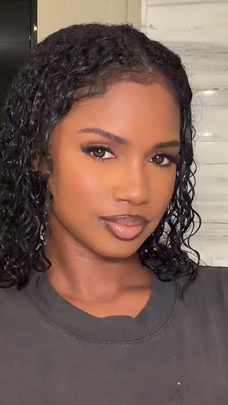 Square Face Shape Makeup Ideas: 6 Looks for Soft Angles 6 Woman with curly hair and full face makeup posing for a portrait